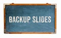 Ã¢â¬ÅBackup SlidesÃ¢â¬Â text word message written on a wide blue old grungy vintage wooden chalkboard or retro blackboard Royalty Free Stock Photo